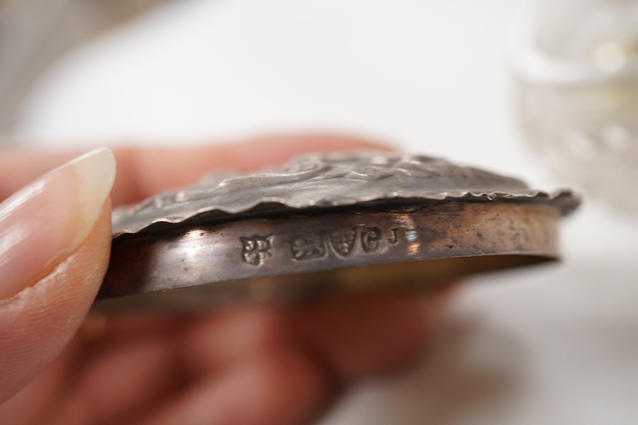 A pair of late Victorian silver mounted cut glass globular scent bottles, by C.C. May & Sons, Birmingham, 1898, height 11.8cm, together with three other silver mounted glass toilet jars and a pair of white metal overlaid